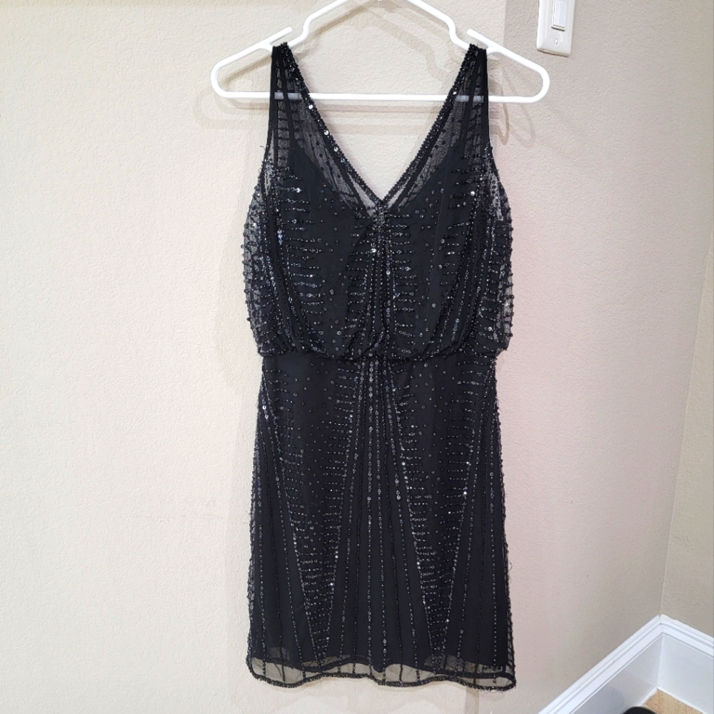 Adrianna Papell Black sequins and bead black gown.